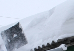 Руководителей предприятий и жителей Искитима предупреждают о необходимости очистки крыш зданий от снега
